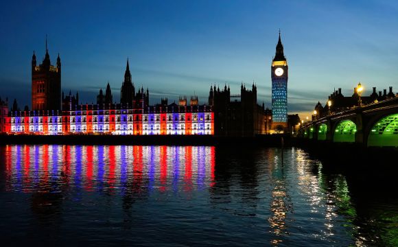 Projections on Big Ben in London to celebrate the Coronation of King Charles III - Light show on Elizabeth Tower and the Houses of Parliament in Westminster, London, United Kingdom
