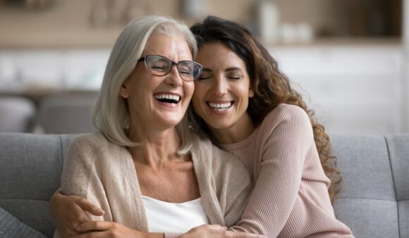 Mum and daughter embracing