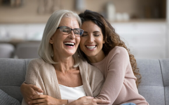 Mum and daughter embracing