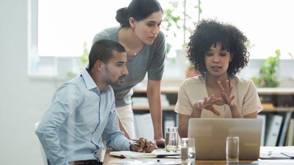 Cropped shot of a group of business colleagues meeting in the boardroom